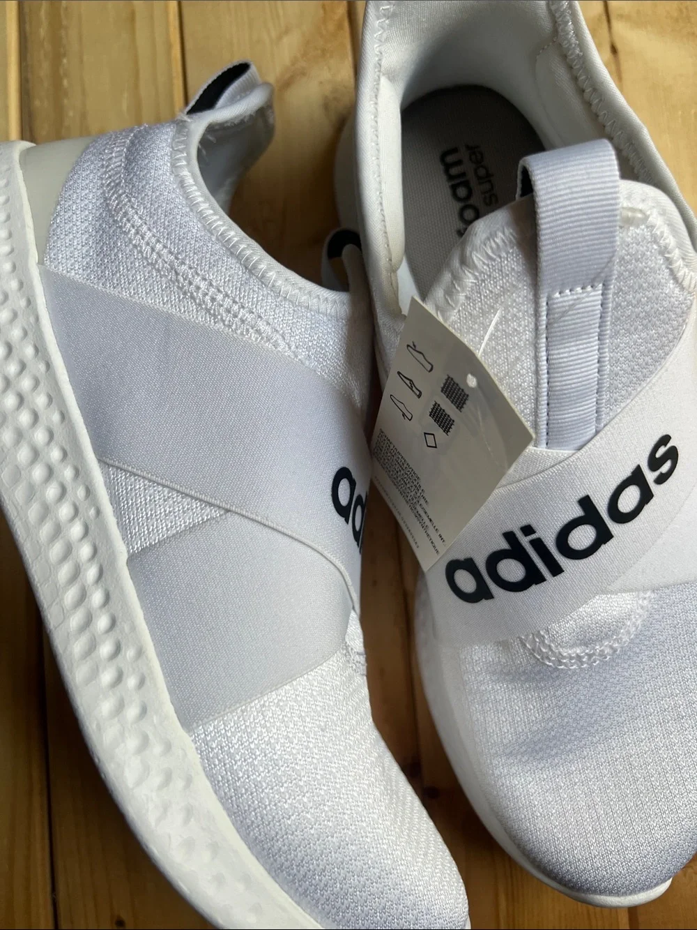 adidas White Slip-On Sneakers with Black Logo